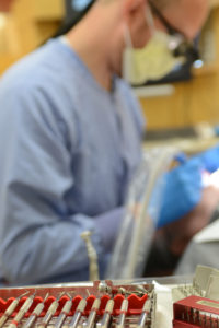 Dental student treats a patient at the School of Dentistry.