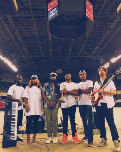 Elester Bostick-Latham with James Lindsey (center) and his band. 