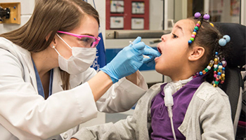 UofL's School of Dentistry has provided free dental care to local children on the first Friday in February (national Give Kids a Smile day) since 2002