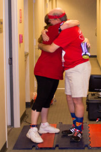 Steve Lindsey embraces his wife, Lisa, also a UofL employee, after the 2016 Fight for Air Climb event. 