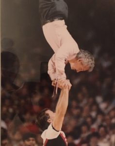 UofL fans may recall Acton's handstands during games at Freedom Hall.