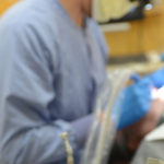 Dental student treats a patient at the School of Dentistry.