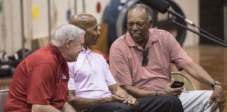 Coach Denny Crum and former UofL basketball players Darrell Griffith and Wade Houston helped fans say goodbye to Crawford Gym.