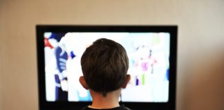 child watching television