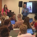 Joe D’Ambrosio instructs a group of students