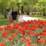 Becca Kemp and her two children on campus.