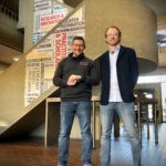 UofL researcher Brad Shuck (left) and entrepreneur Charley Miller (right) in the CEHD atrium