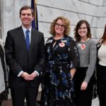 UofL researchers joined Gov. Andy Beshear at a Jan. 7 Capitol Rotunda news conference to raise human trafficking awareness. UofL graduate students Tara Sexton, Emily Edwards and Victoria Dobson are shown with Jennifer Middleton (center), associate professor of social work and director of the Human Trafficking Research Institute. Credit Timothy D. Easley.