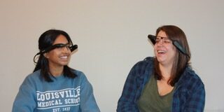 Lekha Devara and Briana Coleman, second-year medical students, wearing smart glasses.