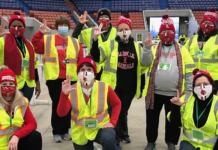 UofL faculty at Broadbent Arena drive-thru vaccination event