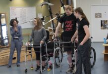 Claudia Angeli, Ph.D., left, with UofL research participants Kelly Thomas and Jeff Marquis and trainer Kristin Benton