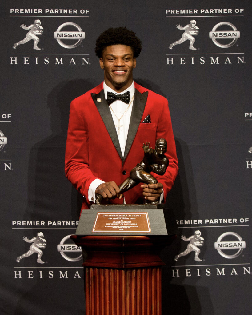 Lamar Jackson puts Louisville jersey back on for Heisman House