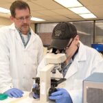 Professor and Associate Dean Michael Menze, left, and National Science Foundation graduate fellow Clinton Belott.