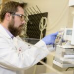 Pawel Lorkiewicz, assistant professor of chemistry and a researcher in the UofL Superfund Research Center, established methods for detecting and quantifying urinary metabolites of VOCs which are used in the human and wastewater studies for VOC exposure.