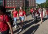 Students walking across campus.