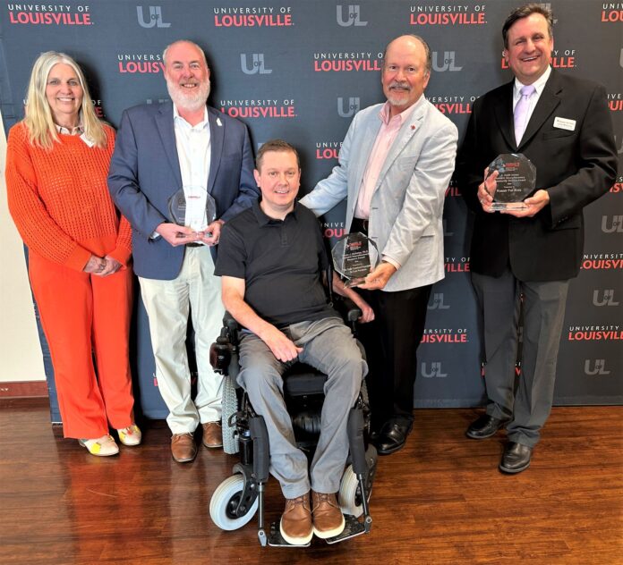 UofL's Kosair for Kids Center for Pediatric NeuroRecovery presented awards to community organizations in May. Left to right: Susan Harkema, Hal Hedley, Todd Crawford, Keith Inman and Chris Williams. UofL photo.