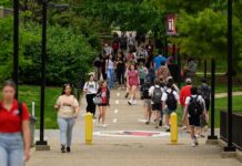 Students walking through the Belknap Campus.