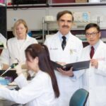 UofL cardiologist Roberto Bolli, center, leads a new, multicenter clinical trial of an IV-delivered stem cell therapy for heart failure at the University of Louisville and UofL Health. UofL photo.