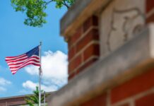 American flag on UofL's Belknap Campus.