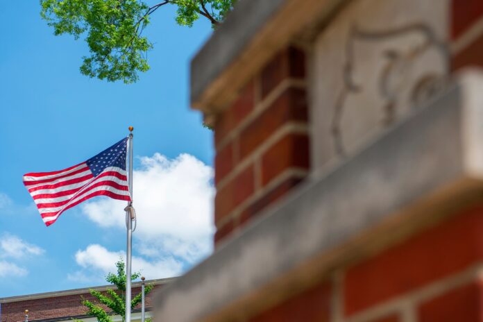 American flag on UofL's Belknap Campus.