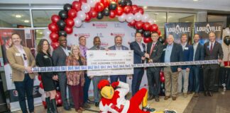 UofL College of Business faculty and representatives of Louisville Tourism and the Louisville Hotel Partnership celebrated the launch of a new minor in hospitality management