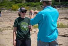 Woman taking part in fishing event