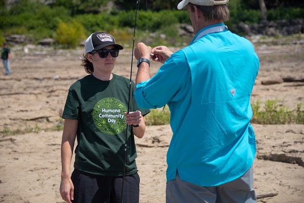 Woman taking part in fishing event