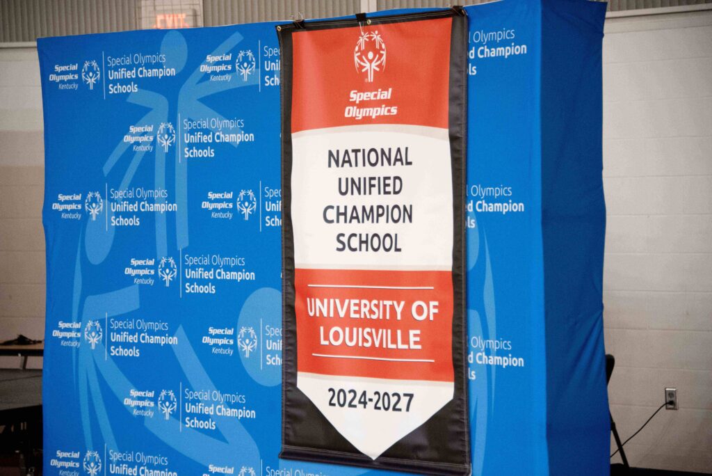 A banner reads "Special Olympics National Unified Champion School University of Louisville 2024 - 2027"