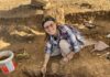 Woman at archaeological dig