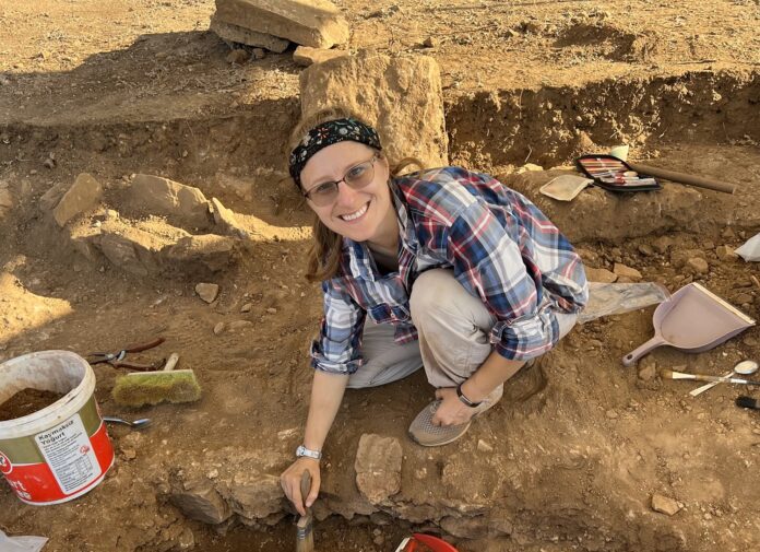 Woman at archaeological dig